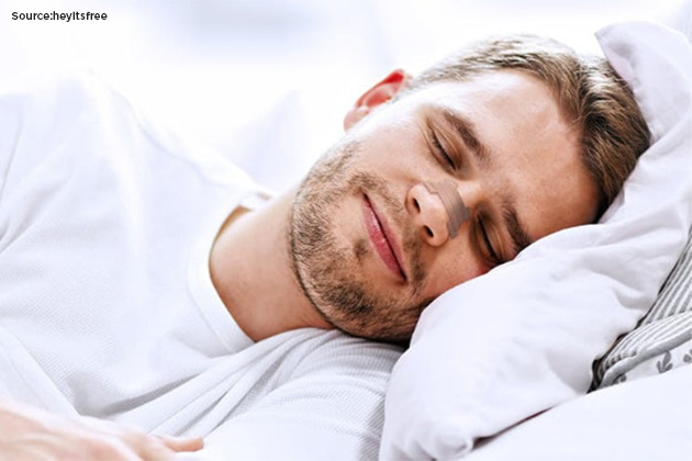 Person sleeping with nasal strip