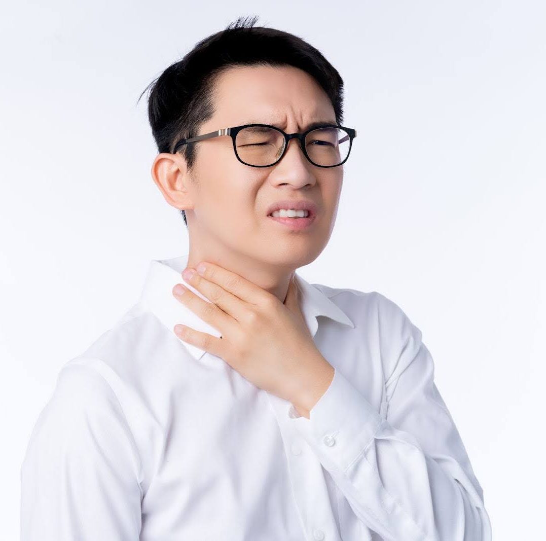 a man with sore throat